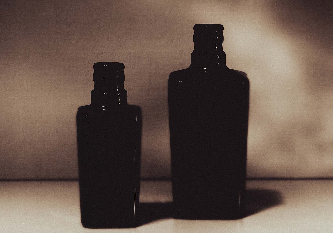 bottiglie al crespucolo poster d'autore