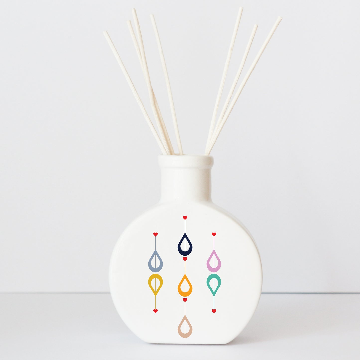 Profumatore in ceramica con grafica d’autore “Incontri geometrici"