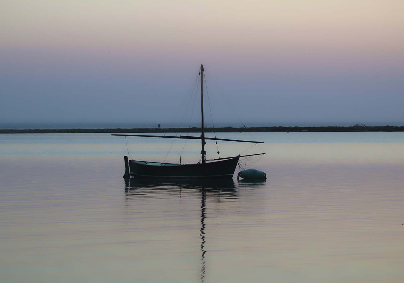 Barca al tramonto  poster d'autore