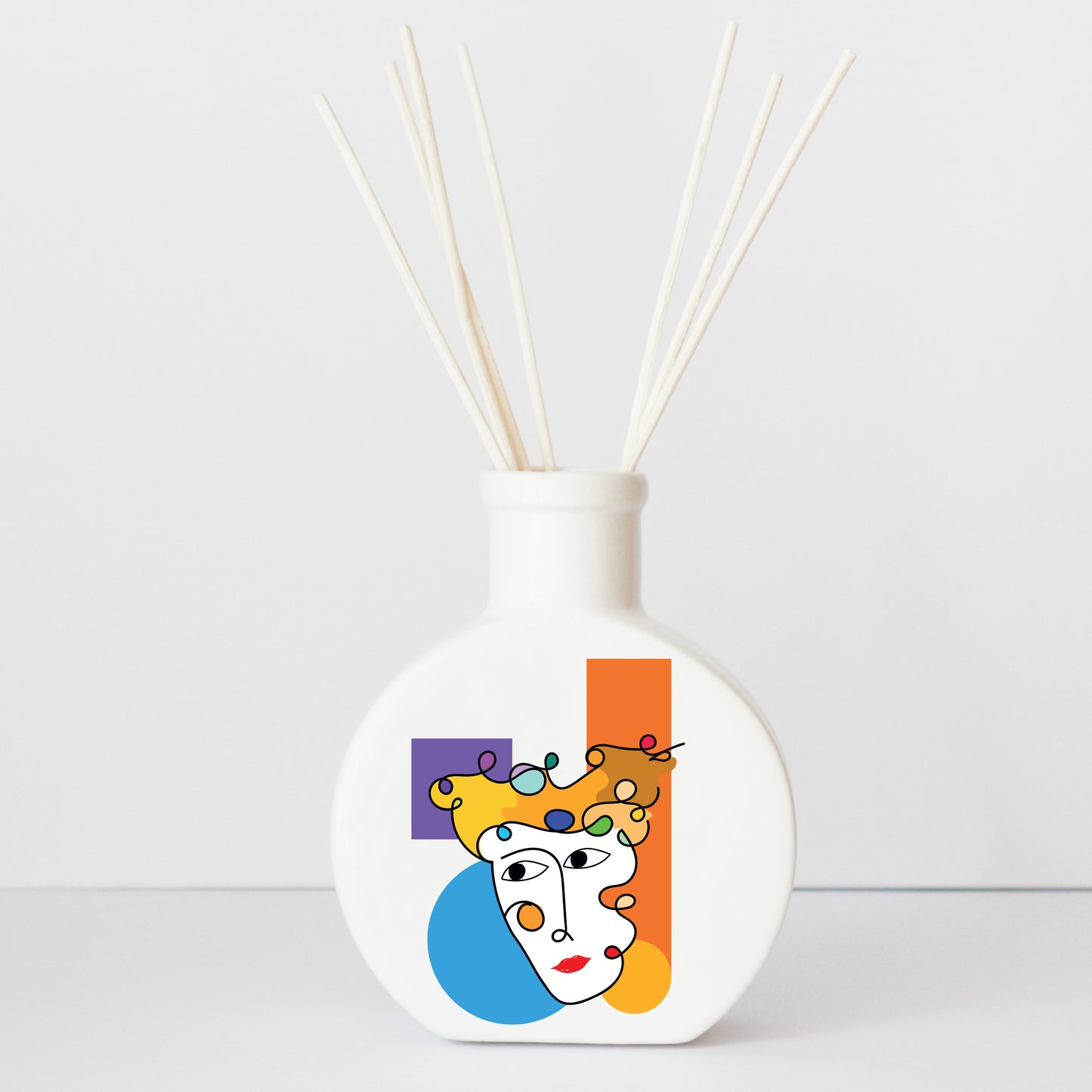 Profumatore in ceramica con grafica d’autore “Volto geometrico"